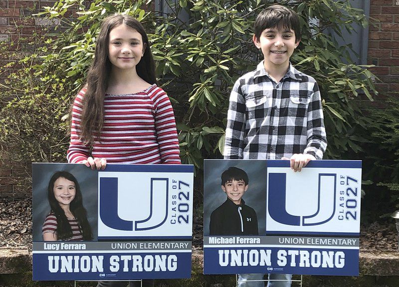 Union Girl Scouts show appreciation through signs